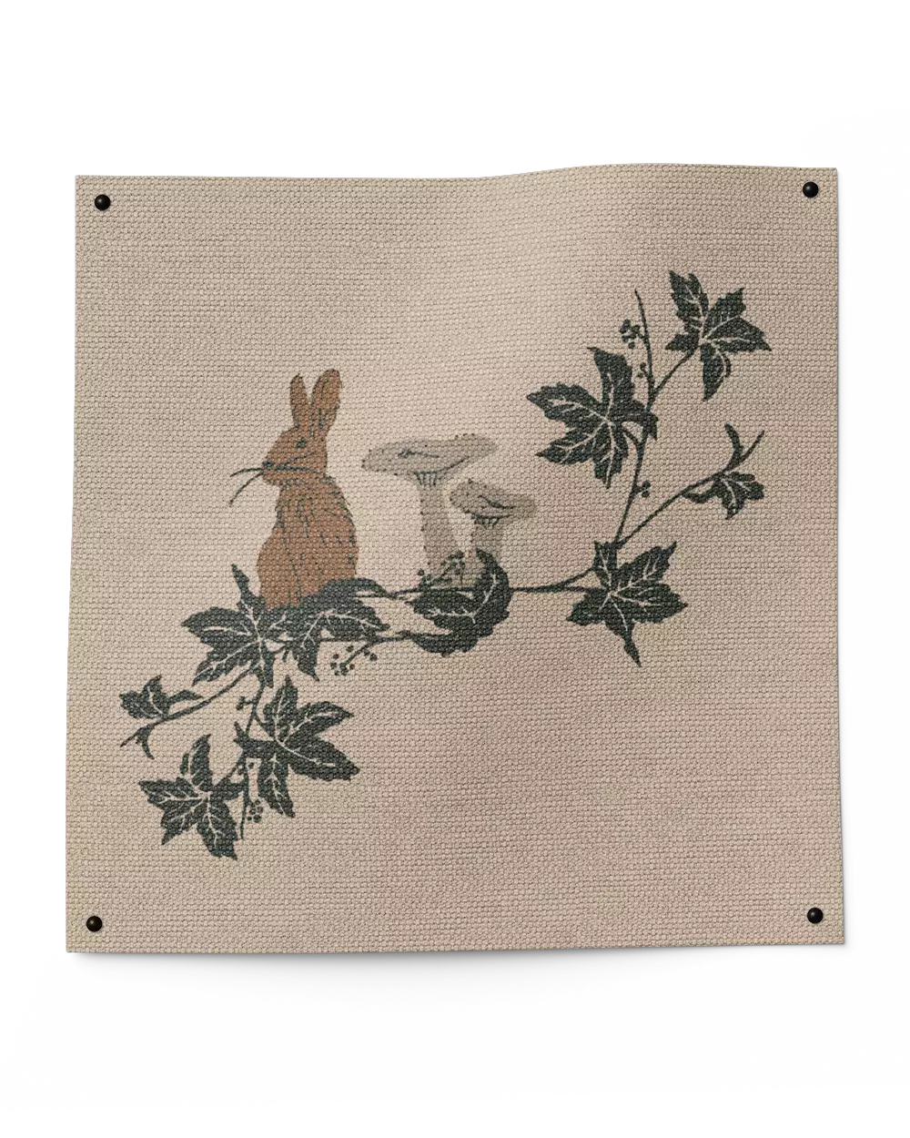 Detail of print design - illustration of a bunny and some mushrooms surrounded by leaves, shown on a fabric swatch. Print design by kidswear designer, Marie Gallagher